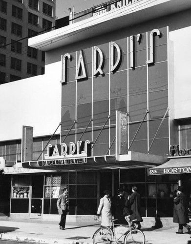 People stroll past Sardi's