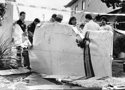 Wreckage of plane wing at crash site