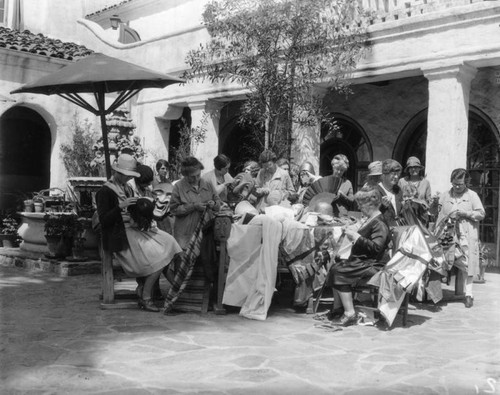 Costume makers working outdoors