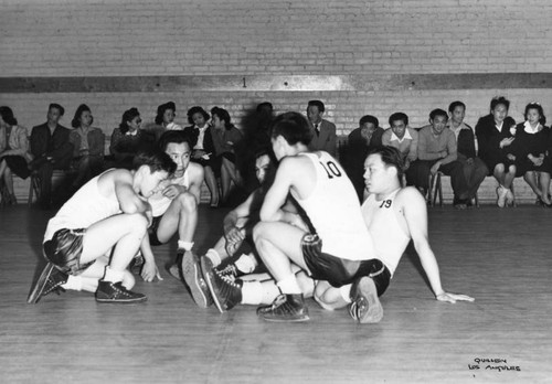 Boys playing basketball