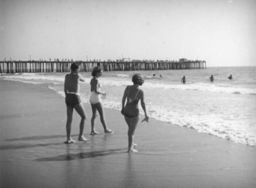 Walking into the surf at Newport Beach