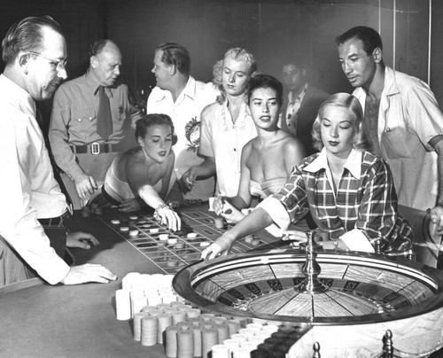 Customers at the roulette table