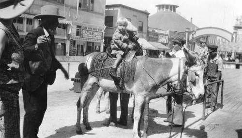 Child on burro