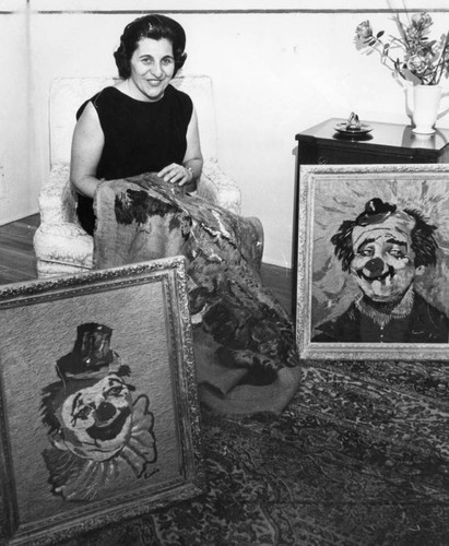 Mrs. Howard Altounian, Van Nuys, keeps painting in stitches