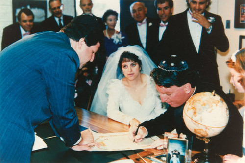 Couple signing wedding contract