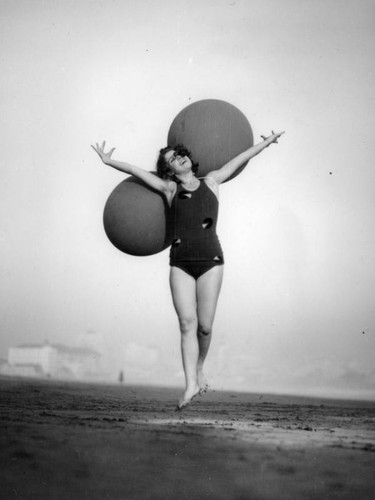 Beach beauties doing rhythmic gymnastics, view 3