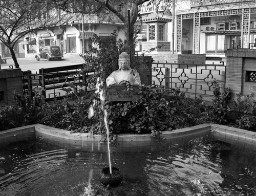 Buddha wishing well in New Chinatown