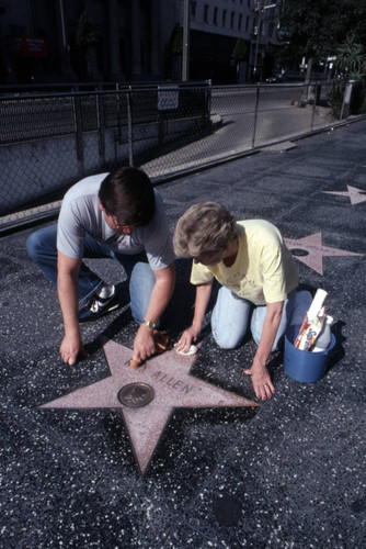 Cleaning a Walk of Fame star