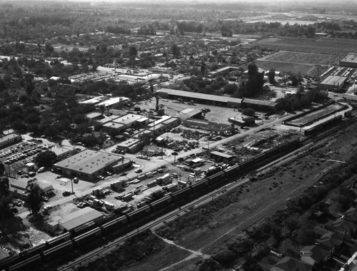 E.K. Wood Lumber Co., Raymer Street, looking southwest