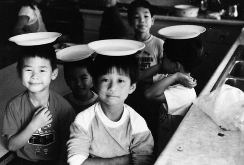 Children with plates