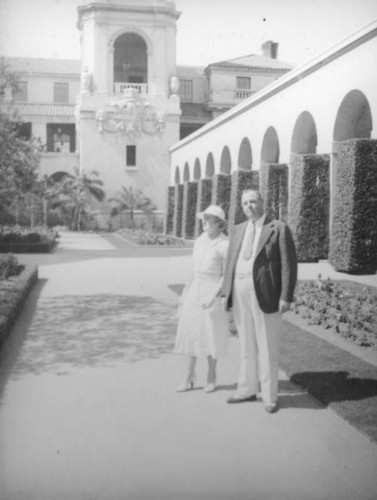 Couple by a Pasadena arcade