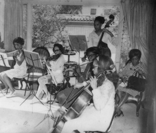 Alpha Kappa Alpha Sorority ensemble plays