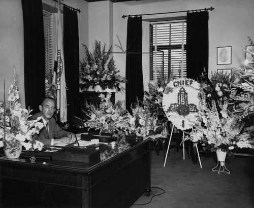 Chief Parker at his desk