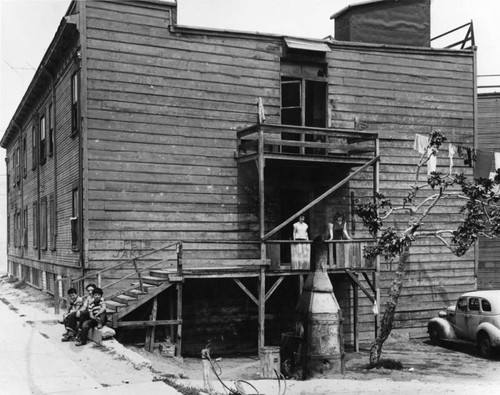 Two story building, slum housing