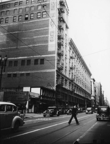 A pedestrian crossing Broadway