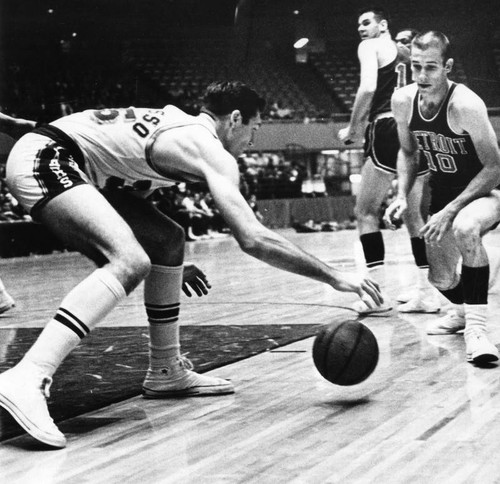 Los Angeles' Rudy LaRusso dribbles low to the court