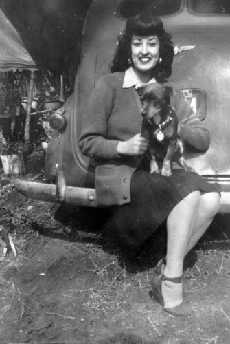 Woman holding a dog