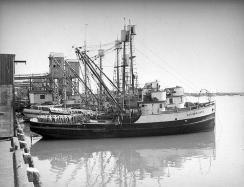 Rope covered rowboat on the Golden Gate, Terminal Island