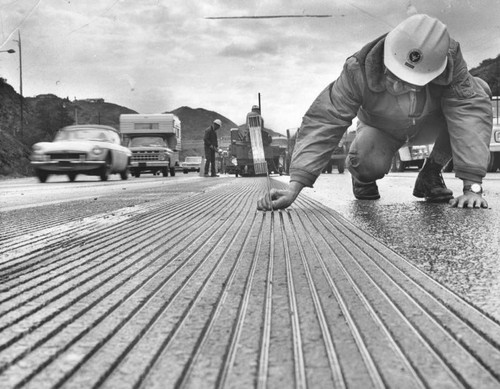 Checking depth of ridges, Hollywood Freeway