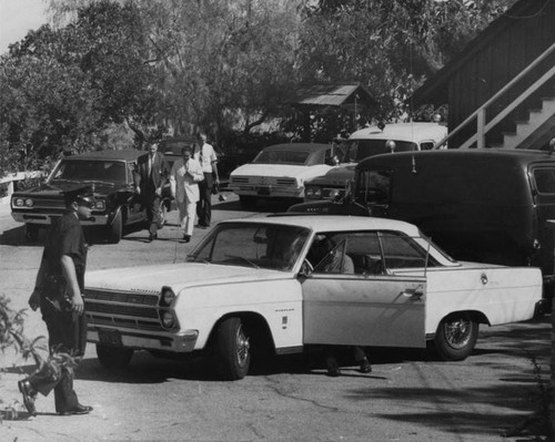 Coroners at murder scene