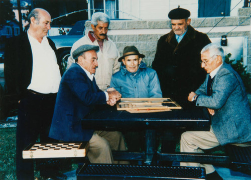 Men playing backgammon