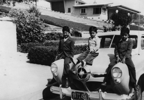 Boys on car