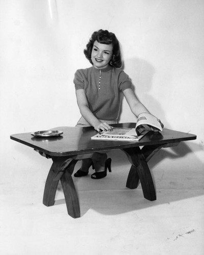 Actress builds table