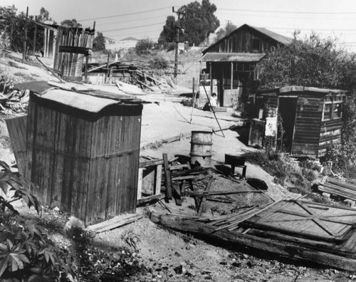 View of a slum house and it's outlying buildings