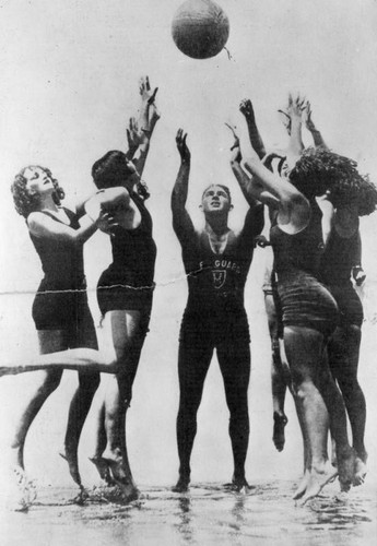 Lifeguard George Marshall with beach beauties