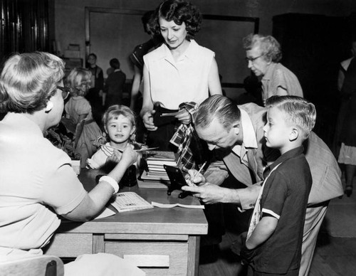 Parents bring children to classroom