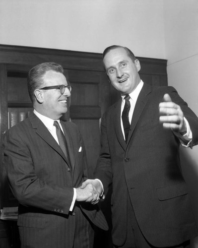 Curtis accompanies Representative Thomas Rees at his Congressional Office