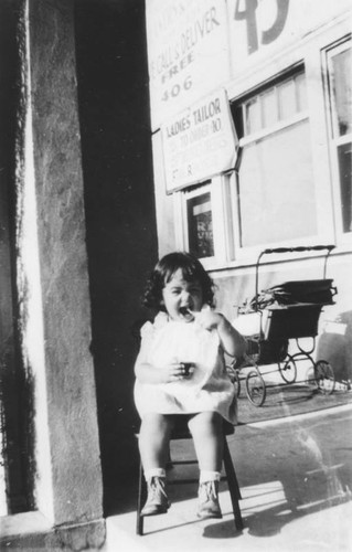 Child sitting in chair