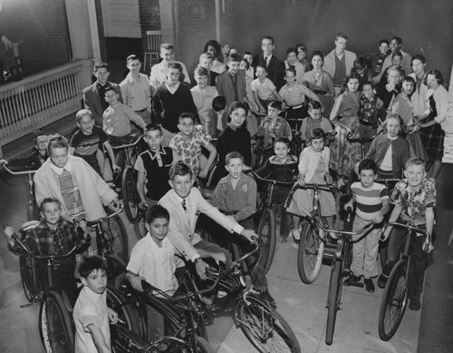 Orphan children and bicycles