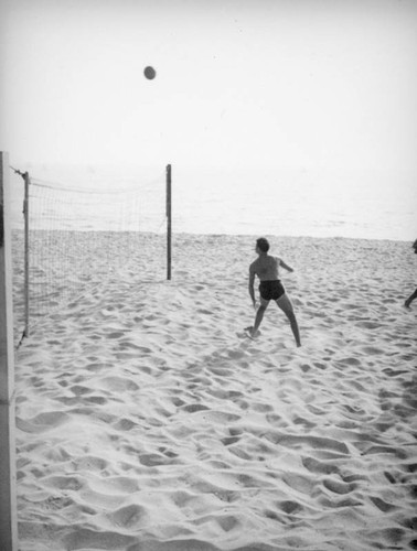 A game of volleyball at the beach