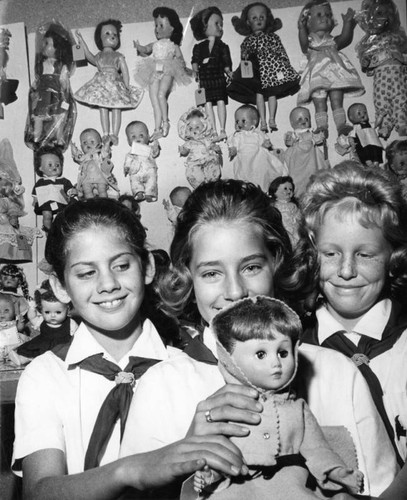 Campfire Girls inspect their handiwork