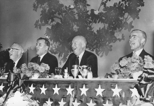 Eisenhower enjoys a hearty laugh