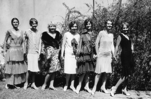 Seven beauties in stylish attire