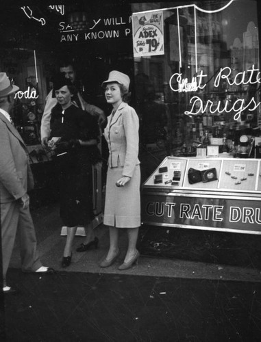 Ladies in front of cut rate drug store