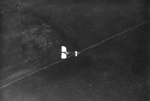 Aerial view of a monoplane in flight