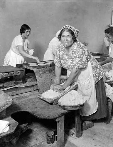 Grinding corn for tortillas