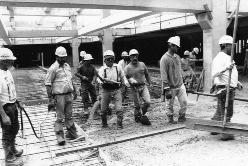 Construction workers at the MTA building