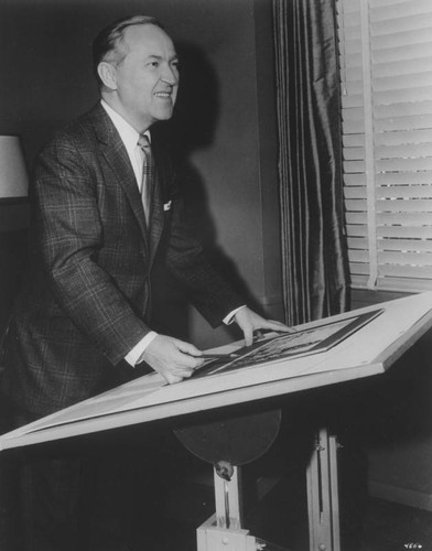 George Pal at drawing table