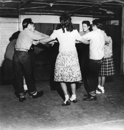 Navajo students dancing in circle