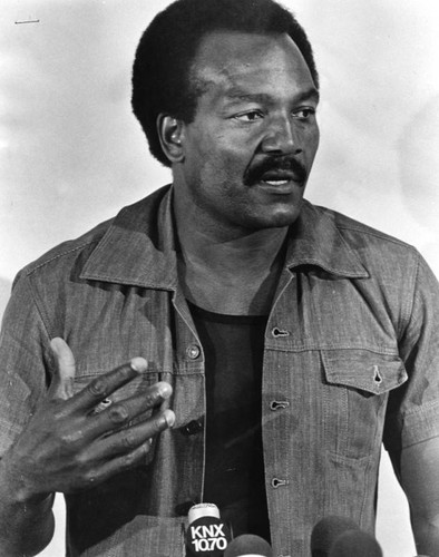 Jim Brown talks to the press