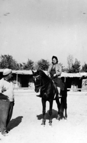 Armenian woman on horseback