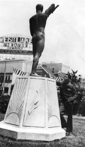 Man at Statue in Westlake Park