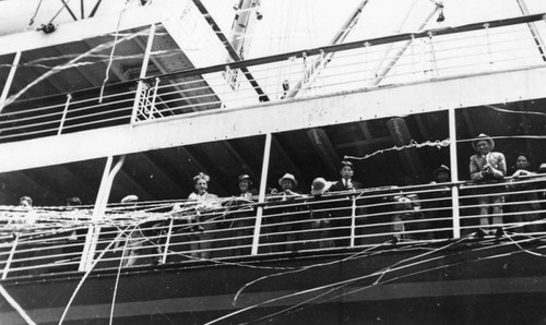 Passengers on departing ship