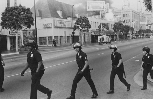 Police patrol street