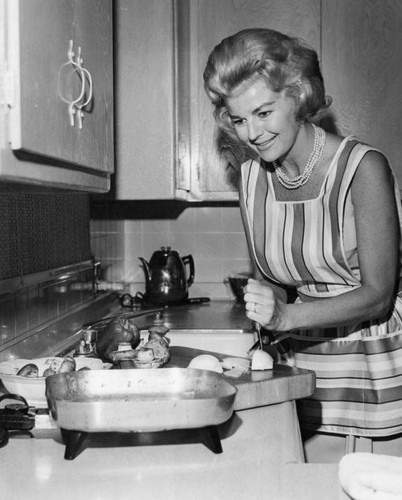 Rosemary prepares vegetables for deviled crab