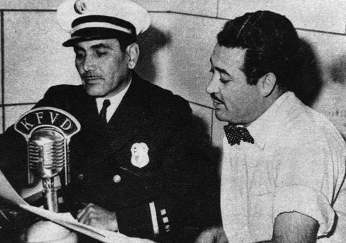 Eddie Rodriguez and Captain Madrid at radio station